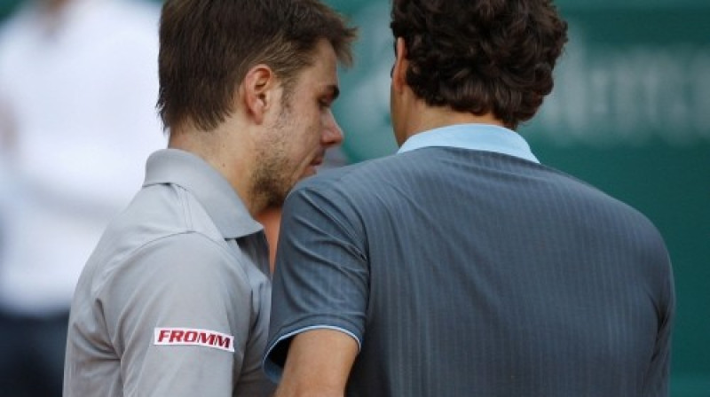 Staņislass Vavrinka un Rodžers Federers
Foto: AFP