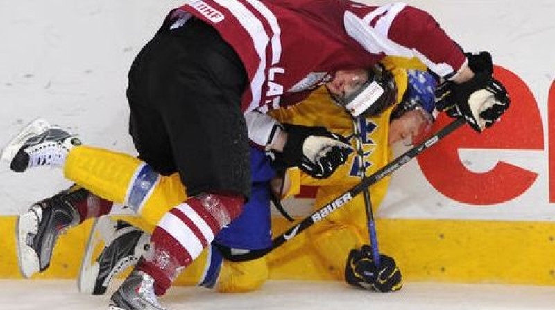 Kristaps Sotnieks cīņā ar pretinieku
Foto: AFP