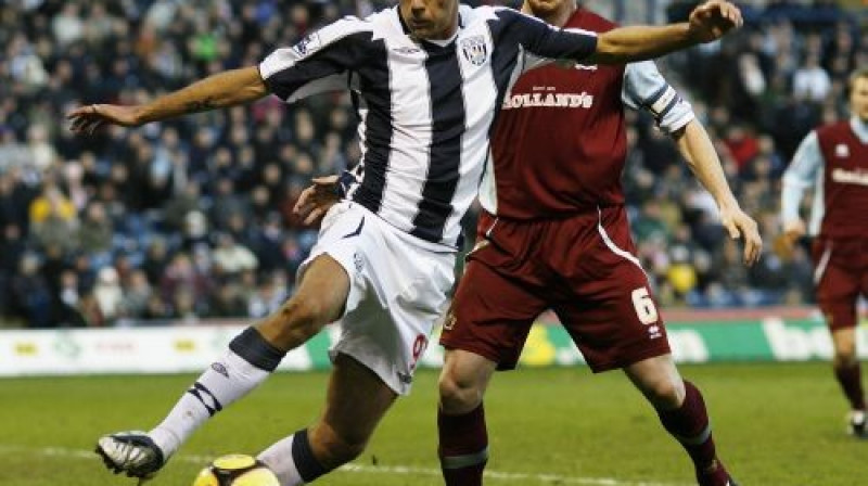 Romans Bednars (no kreisās) 
Foto: AFP