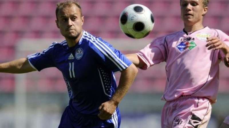 Andrejs Perepļotkins (no kreisās)
Foto: Romāns Kokšarovs, Sporta Avīze, f64