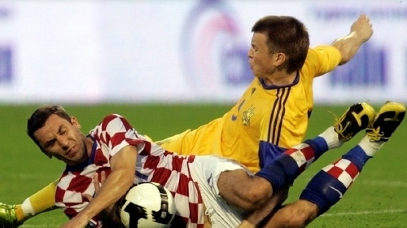 Horvātijas un Ukrainas sāncensība
par 2. vietu turpinās... Foto: AP
