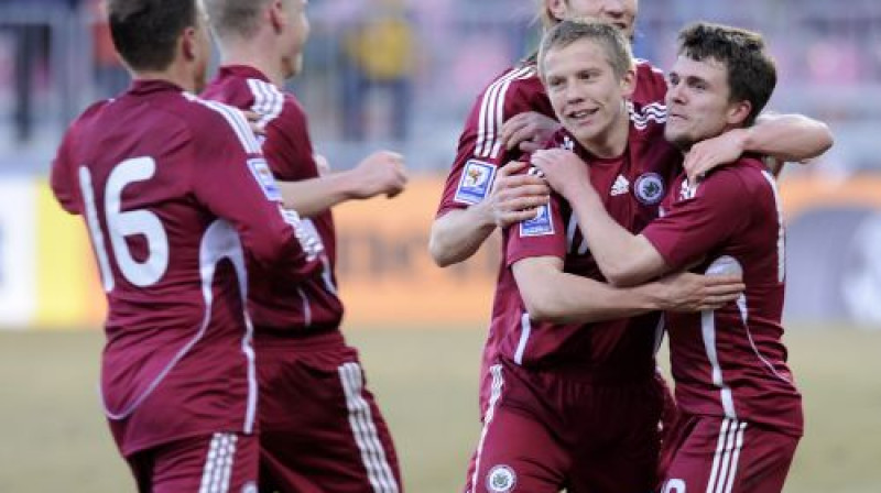 Latvijas izlase var svinēt panākumu
Foto: Romans Kokšarovs, Sporta Avīze