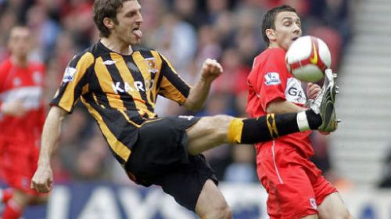 Samuels Rikets (priekšplānā) darbībā
Foto: AFP