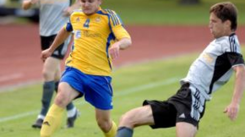 Jurijs Žigajevs cīņā pret "BATE" futbolistu
Foto: Romāns Kokšarovs, Sporta Avīze, f64
