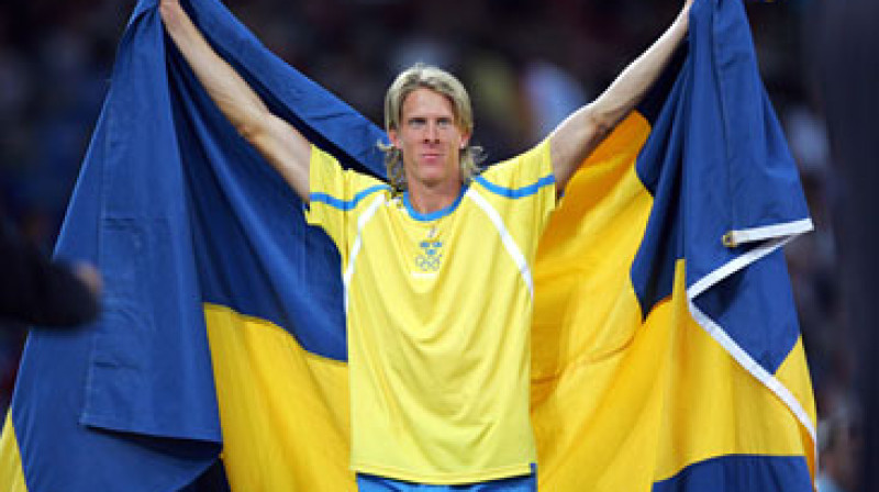 Kristians Olsons pēc uzvaras Olimpsikajās spēlēs Atēnās 2004.gadā
Frank Fife/AFP