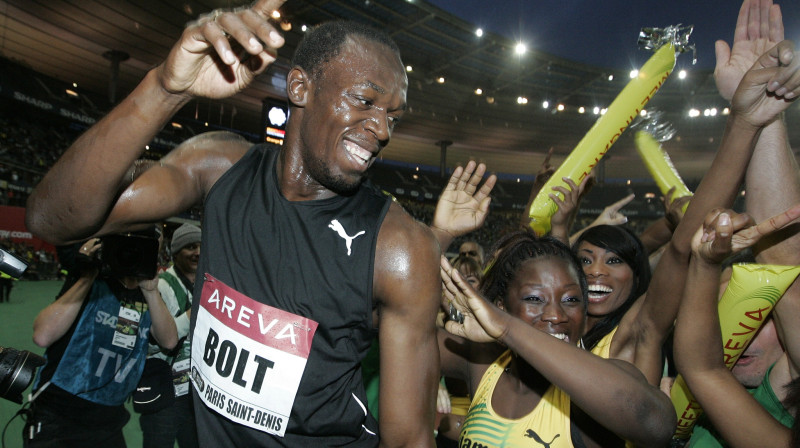 Useins Bolts ar tautietēm
Foto: AP