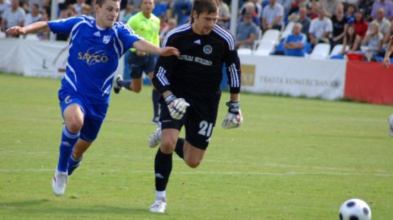 Andrejs Kovaļovs sacenšas ar Pāvelu Šteinboru
Foto: Viktors Sarvuta