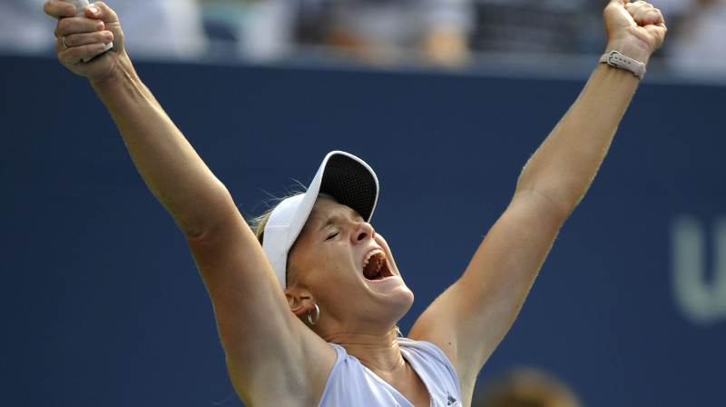 Udāna priecājas pēc uzvara pār Petrovu.
AFP foto