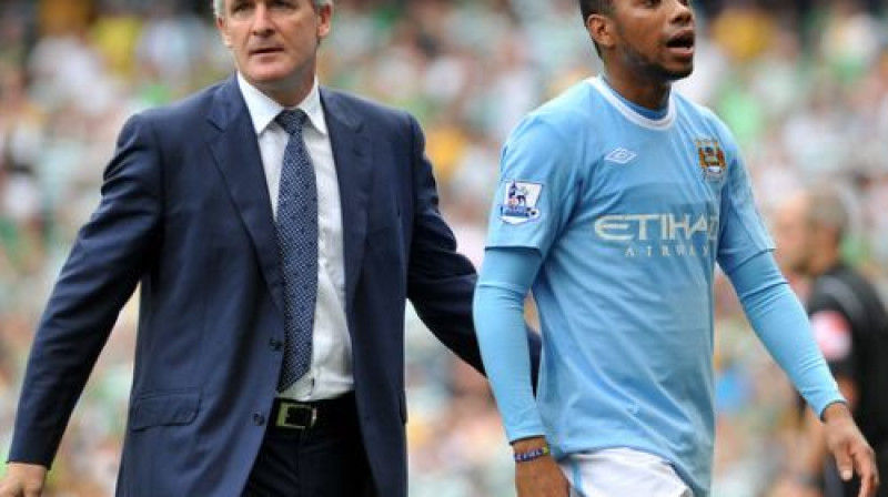 Marks Hjūzs nelaidīs prom Robinju...
Foto: Manchester City FC/Scanpix