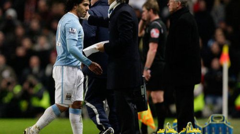 Karloss Tevezs un Roberto Mančīni
Foto: AP/Scanpix