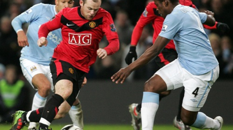 Veins Rūnijs cīņā ar "City" aizsargiem
Foto: AP/Scanpix