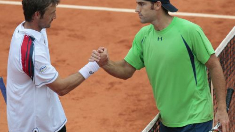 Huans Karloss Ferrero un Robijs Džinepri
Foto: AFP/Scanpix