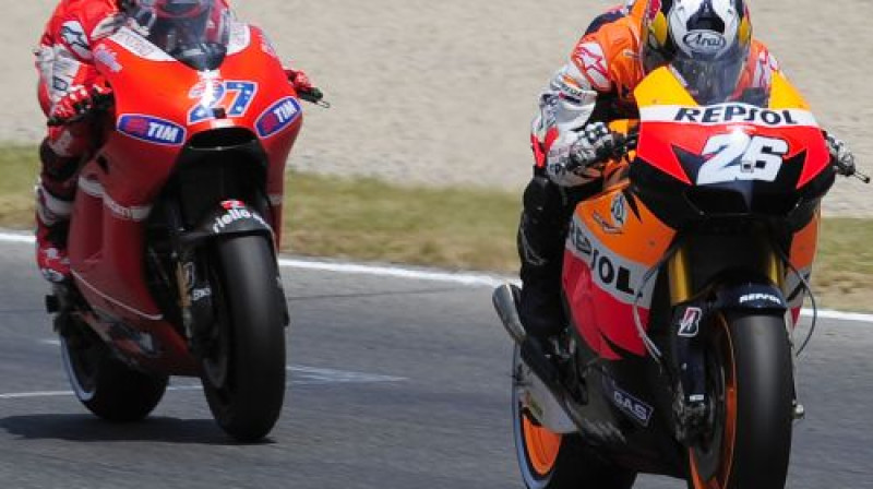 Keisijs Stouners un Dani Pedrosa, iespējams, nākamgad brauks vienā komandā
Foto: AFP/Scanpix