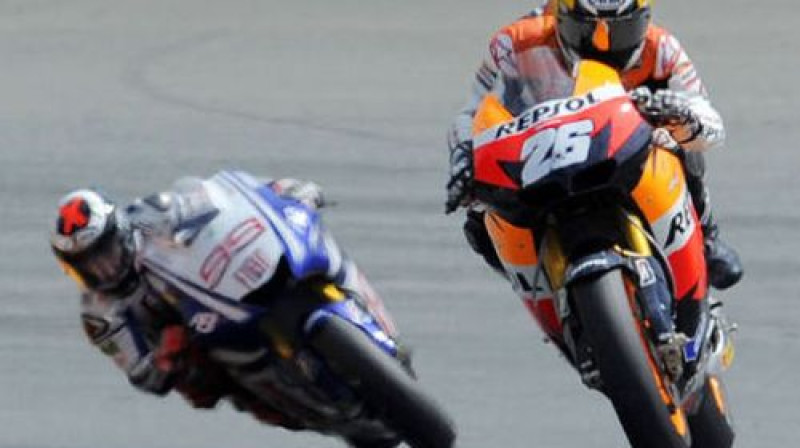 Sacīkšu uzvarētājs Dani Pedrosa (priekšplānā)
Foto: AFP/Scanpix