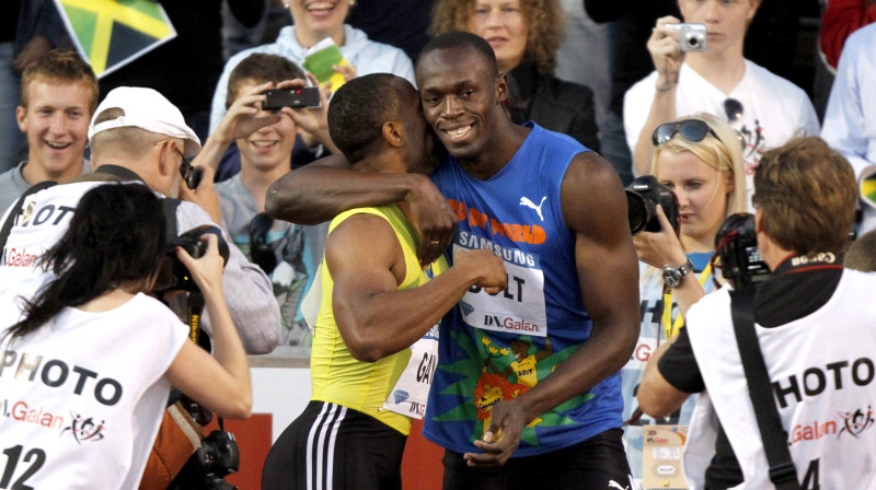 Useins Bolts apsveic Taisonu Geju pēc finiša
Foto: AFP/Scanpix