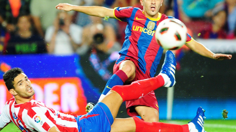 Davids Vilja (pa labi) šodien guva savus pirmos vārtus "Camp Nou" Barselonas komandas formastērpā
Foto: AP/Scanpix.