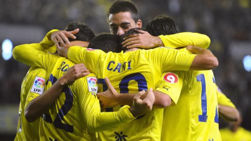 "Villarreal" futbolisti atzīmē vārtu guvumu
Foto: AFP/ Scanpix