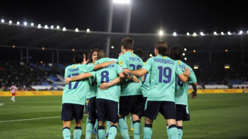 "Barcelona" futbolisti atzīmē vārtu guvumu Almērijā
Foto: AFP/ Scanpix