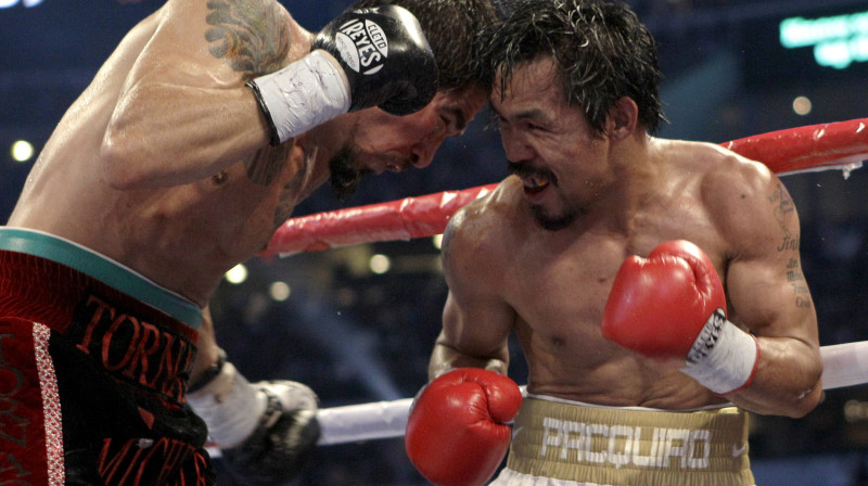 Menijs Pakjao (pa labi) cīņā pret Antonio Margarito
Foto: AP/Scanpix