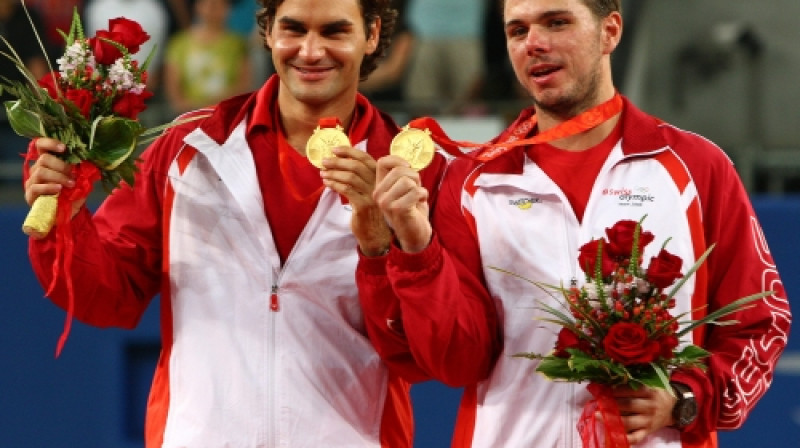 Pekinas olimpisko spēļu zelta medaļu ieguvēji dubultspēlē Rodžers Federers un Stanislass Vavrinka šoreiz būs tīkla pretējās pusēs
Foto: AFP/Scanpix