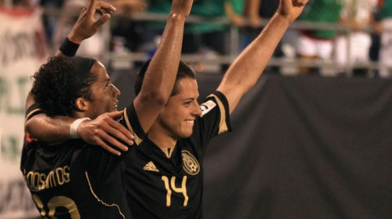 Džovanni dos Santoss un Čičarito
Foto: AFP/Scanpix