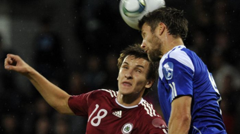 Vladislavs Kozlovs (pa kreisi)
Foto: Romāns Kokšarovs, Sporta Avīze, f64