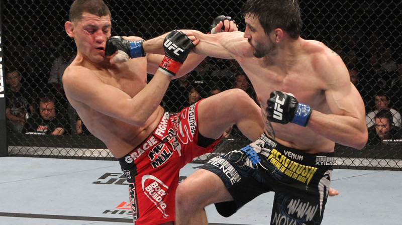 Niks Diazs (pa kreisi) cīņā ar Karlosu Konditu
Foto: ufc.com