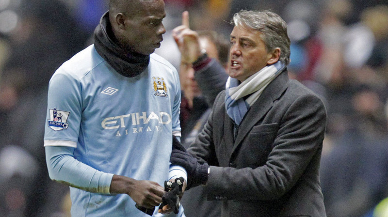 Mario Balotelli un Roberto Mančīni 
Foto: AFP/Scanpix