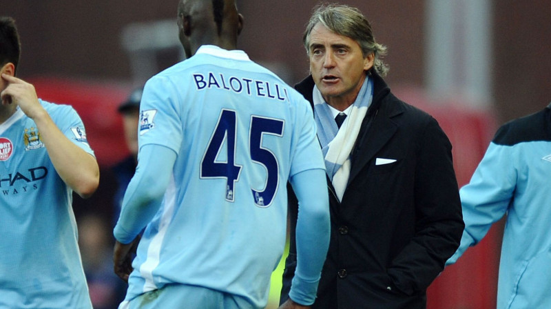 Mario Balotelli un Roberto Mančīni 
Foto: AFP/Scanpix