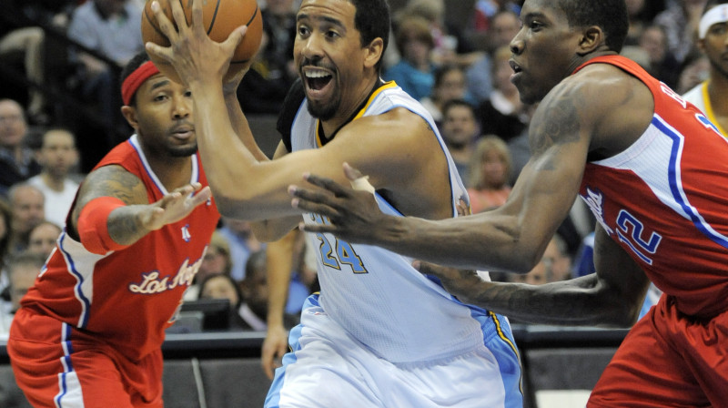 Andrē Millers (ar bumbu) vēl trīs sezonas aizstāvēs "Nuggets" kluba krāsas
Foto: AP/Scanpix