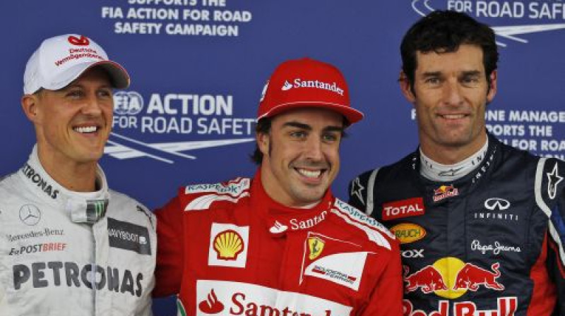 Lielbritānijas kvalifikācijas labāko trijnieks - Mihaels Šūmahers, Fernando Alonso un Marks Vēbers.
Foto: Scanpix