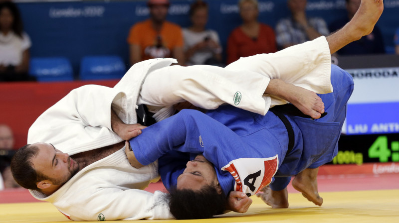 Jevgēņijs Borodavko (baltajā kimono)
Foto: AP/Scanpix