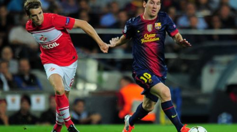 Lionels Mesi mūk no Dmitrija Kombarova
Foto: AFP/Scanpix