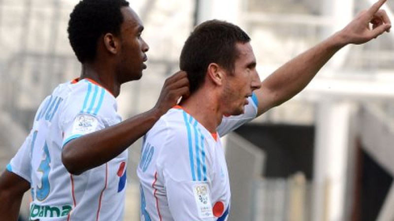 Marseļas "Olympique" vienīgo vārtu autors Morgans Amalfitano (pa labi)
Foto: AFP/Scanpix