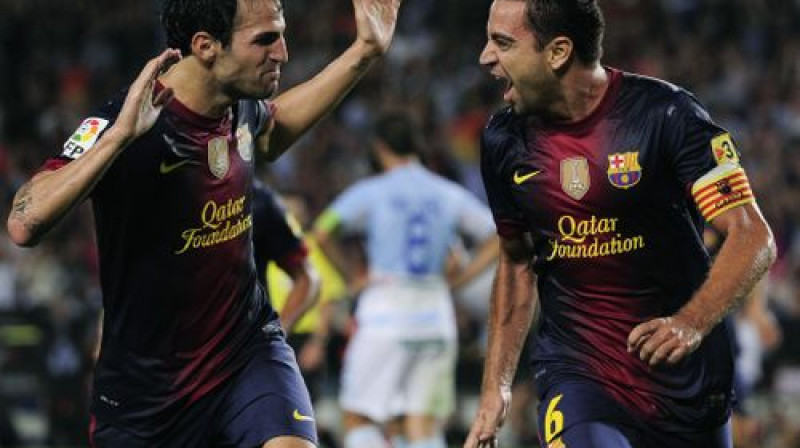 Fransesks Fabregass un Čavi Ernandess atzīmē uzvaras vārtus
Foto: AFP/Scanpix