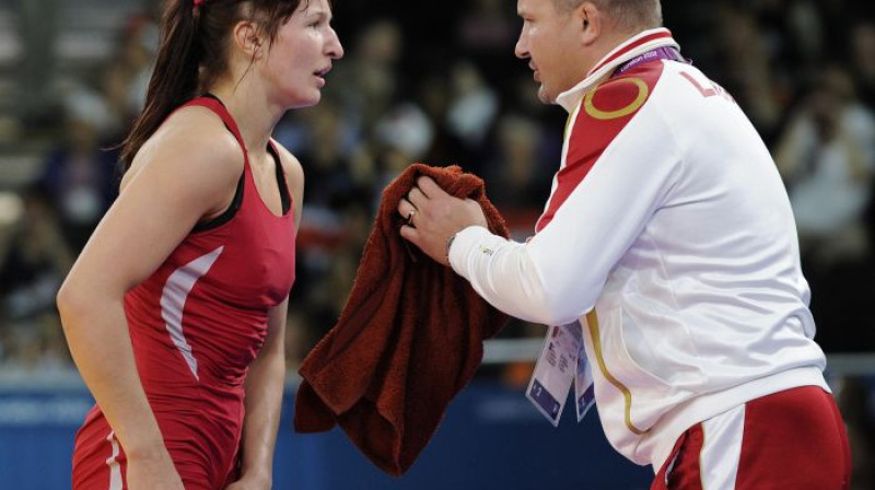 Anastasija Grigorjeva un treneris Sergejs Kursītis
Foto: Romāns Kokšarovs, Sporta Avīze, F64