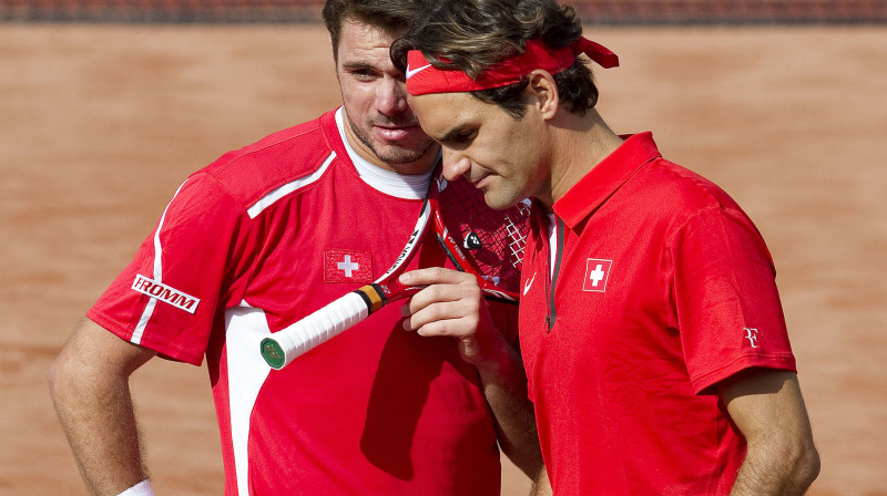 Staņislass Vavrinka un Rodžers Federers
Foto: AFP/Scanpix