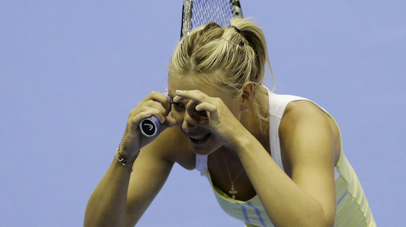 Marija Šarapova izklaidējas paraugspēlēs laikā
Foto: AFP/Scanpix