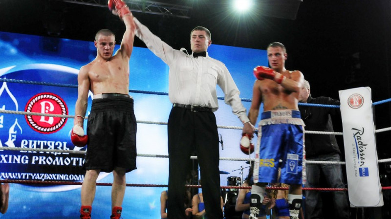 Juris Ivanovs (no labās) ar Dmitro Fedosu uzvarētāja paziņošanas brīdī
Foto: Erik Anderson