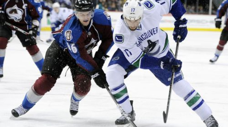 Stefans Eliots ("Avalanche") un Raiens Keslers ("Canucks")
Foto:AP/Scanpix