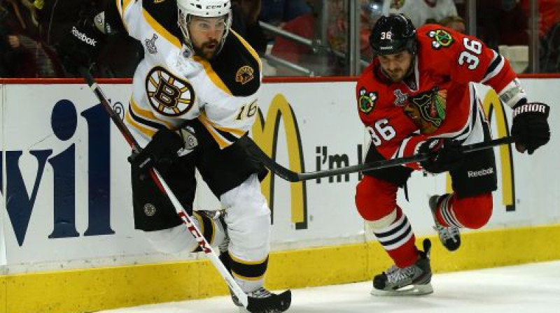 Kaspars Daugaviņš bēg no Deiva Bolanda
Foto: AFP/Scanpix