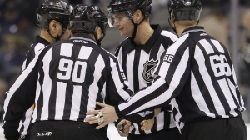 Nacionālās hokeja līgas tiesneši
Foto: AP/Scanpix