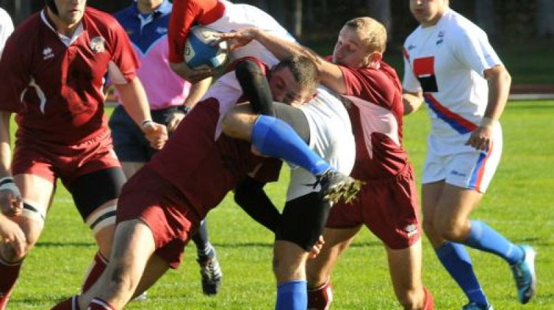 Latvijas regbisti pret Serbiju
Foto: Romualds Vambuts