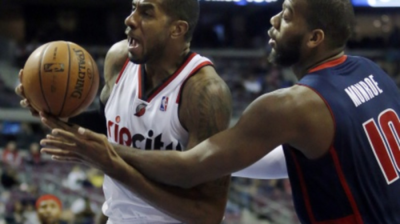 Lamarkuss Oldridžs pret Gregu Monro
Foto: AP/Scanpix