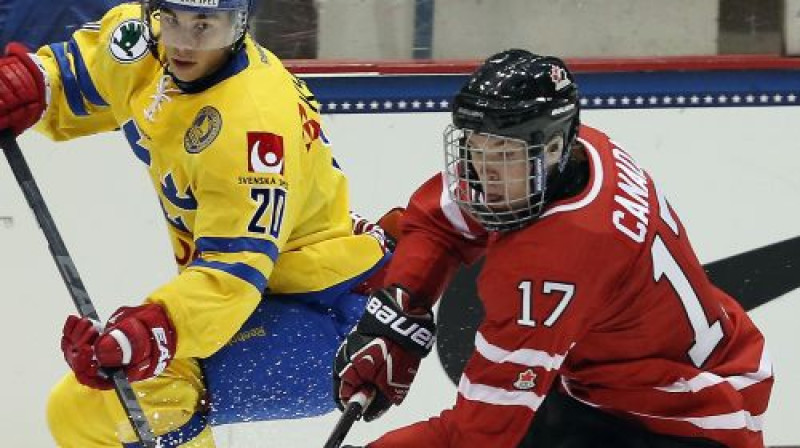 Konors Makdeivids (nr.17) pret Zviedriju pārbaudes turnīrā augustā
Foto:AFP/Scanpix