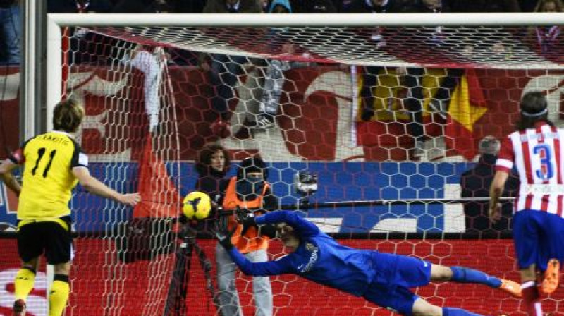 Ivans Rakitičs realizē pendeli pēc Huanfrana pārkāpuma
Foto: AFP/Scanpix