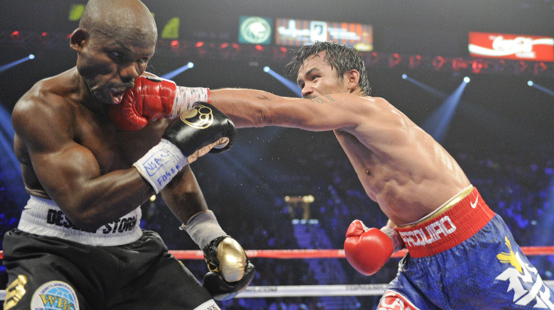 Timotijs Bredlijs un Menijs Pakjao
Foto: AP/Scanpix