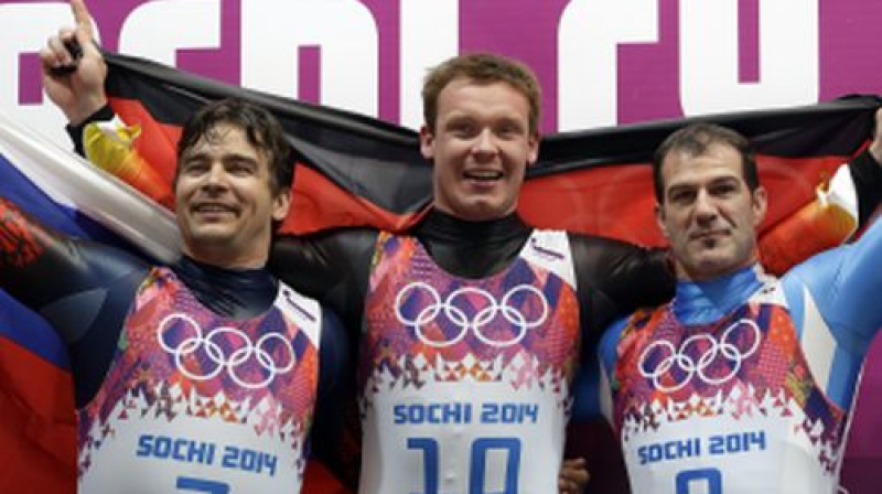 Trīs olimpiskie medaļnieki- Demčenko, Lohs un Cīgelers
Foto:AP/Scanpix