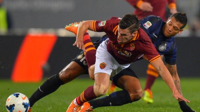 Kevins Strotmans cīņā ar Frediju Gvarinu
Foto: AFP/Scanpix