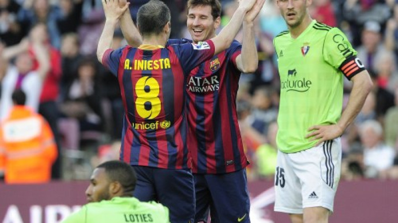 Lionels Mesi un Anderss Injesta
Foto: AFP/Scanpix